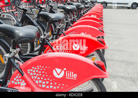 Long line of self-service bicycles in the French city of Lille Stock Photo