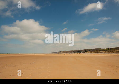 Golden sandy Omaha beach in Normandy, France. Stock Photo
