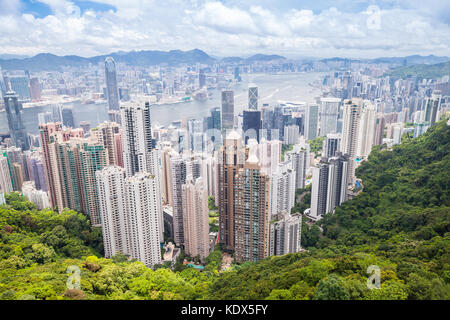 Modern skyline of Hong Kong city, aerial view taken from Victoria Peak viewpoint in sunny summer day Stock Photo
