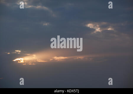 Strong Shafts of Sunlight Burst Through Clouds Above Thorpe Bay near Southend-on-Sea Stock Photo