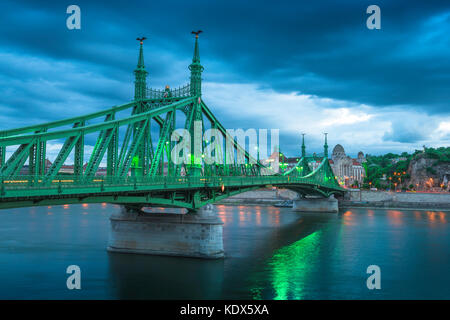 Budapest bridge Danube, view of the Szabadsag - or Liberty - Bridge at dusk spanning the Danube River, central Budapest, Hungary. Stock Photo