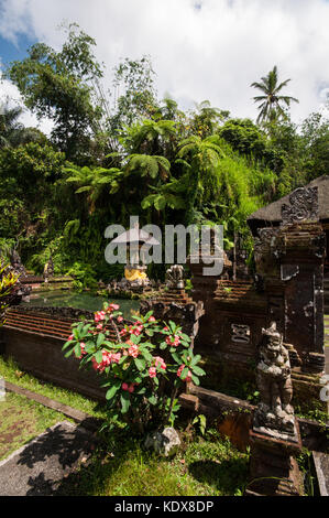 Island temple at the holy springs at Pura Gunung Kawi Sebatu temple, Tegalalang near Ubud, Bali, Indonesia