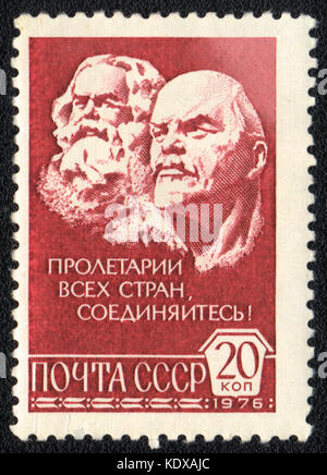 A postage stamp printed in USSR shows Workers of all countries, unite! Karl Marx and Vladimir Lenin,  circa 1976 Stock Photo