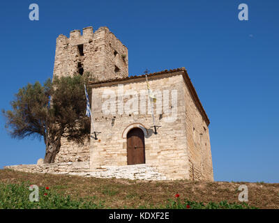 byzantine tower and byzantine church of 12 Apostolles of village Nea Fokea in peninsula Kassandra Halkidiki Greece Stock Photo