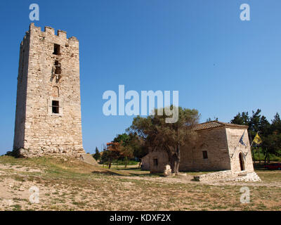 byzantine tower and byzantine church of 12 Apostolles of village Nea Fokea in peninsula Kassandra Halkidiki Greece Stock Photo