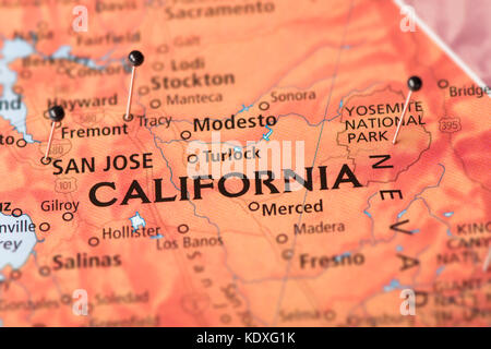 Closeup of California on a political map of the United States with pins in some cities. Stock Photo