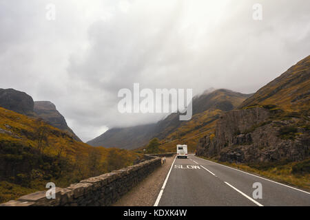 RV pick-up trailer on mountain road in Scotland Stock Photo