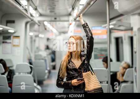 Woman Riding At The Modern Train Stock Photo - Alamy