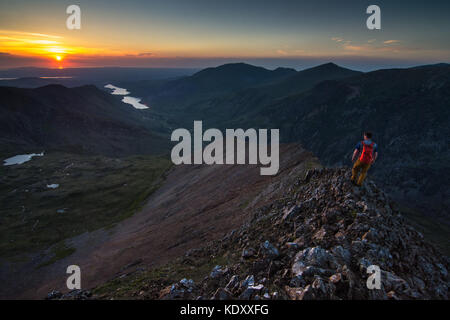 mountaineer walking on ridge above Llanberis north wales, Stock Photo