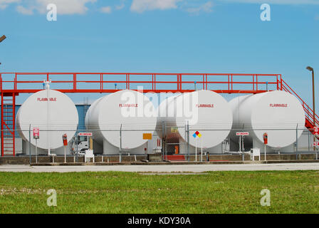 Jet fuel stored in large white canisters Stock Photo