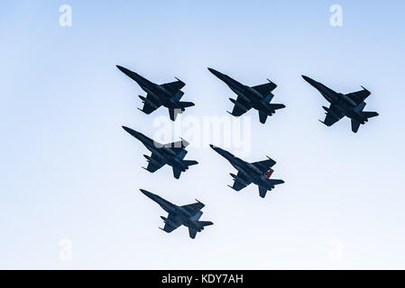 Six F18 Hornet jet fighters flying a blue sky day  Stock Photo