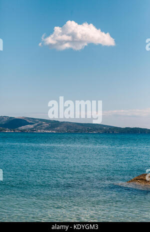 lonely cloud on blue sky, seascape Stock Photo