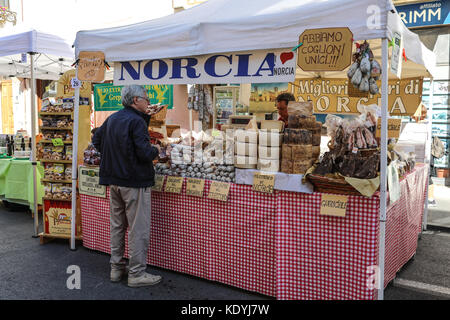 MANZIANA, LAZIO, ITALY - OCTOBER 14, 2017: Famous Italian Norcia products in street stall at the most popular and awaited local events, the chestnut f Stock Photo