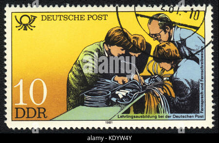 A postage stamp printed in DDR shows apprenticeship training, Postal History of Germany, circa 1981