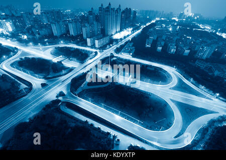detail of traffic on chongqing caiyuanba overpass,blue toned image. Stock Photo