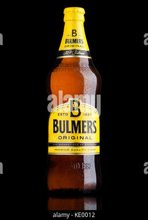 LONDON, UK - MARCH 15, 2017: Bottle Of Bulmers Original Cider on a black background with reflection. It is one of the leading British cider brands in Stock Photo