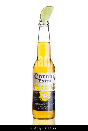 LONDON, UNITED KINGDOM - October 23, 2016: Bottle of Corona Extra Beer on white. Corona, produced by Grupo Modelo with Anheuser Busch InBev, is the mo Stock Photo