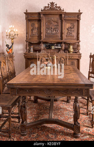 Antique kitchen interior with candles light. Traditional Belgian style. Stock Photo