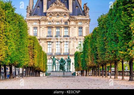 The Jardin des Tuileries (Tuileries Garden), and the beautiful architecture of the Louvre is on display in the background. Paris, France Stock Photo