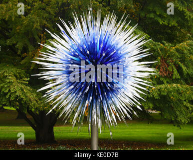 Bronx, New York, USA. 16th Oct, 2017. 'Sapphire Star' (Blown glass and steel), made by glass artist Dale Chihuly held at the Chihuly exhibition at the New York Botanical Garden. The exhibition focuses on mixing blown glass artwork and the natural environment. Credit: Nancy Kaszerman/ZUMA Wire/Alamy Live News Stock Photo