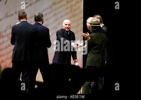 Philadelphia, United States. 16th Oct, 2017. US Senator John McCain (R-AZ) receives the 2017 Liberty Medal out of hands of former VP Joe Biden, during October 16, 2017 a ceremony at the Constitution Center, in Philadelphia, PA. Credit: Bastiaan Slabbers/Alamy Live News Stock Photo