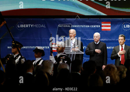 Philadelphia, United States. 16th Oct, 2017. US Senator John McCain (R-AZ) receives the 2017 Liberty Medal out of hands of former VP Joe Biden, during October 16, 2017 a ceremony at the Constitution Center, in Philadelphia, PA. Credit: Bastiaan Slabbers/Alamy Live News Stock Photo