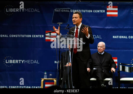 Philadelphia, United States. 16th Oct, 2017. US Senator John McCain (R-AZ) receives the 2017 Liberty Medal out of hands of former VP Joe Biden, during October 16, 2017 a ceremony at the Constitution Center, in Philadelphia, PA. Credit: Bastiaan Slabbers/Alamy Live News Stock Photo