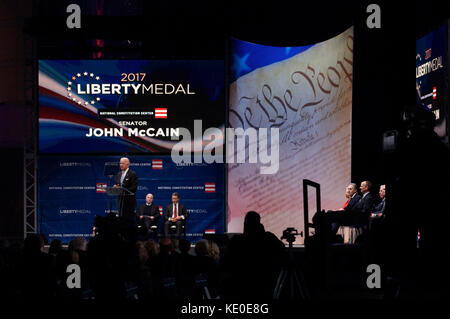 Philadelphia, United States. 16th Oct, 2017. US Senator John McCain (R-AZ) receives the 2017 Liberty Medal out of hands of former VP Joe Biden, during October 16, 2017 a ceremony at the Constitution Center, in Philadelphia, PA. Credit: Bastiaan Slabbers/Alamy Live News Stock Photo