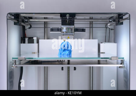 3D - printer, printing a 3d selfie with PLA (Polylactide) filament, human bust - Close Up- frontal view Stock Photo