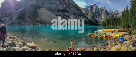 People enjoying Lake Moraine with kayaks in Jasper National Park, Canada Stock Photo