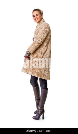 Winter things. Full length portrait of smiling stylish woman in winter coat isolated on white Stock Photo