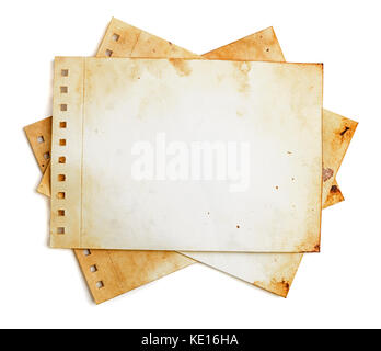 Heap of vintage style note pages on white. Work parh Stock Photo