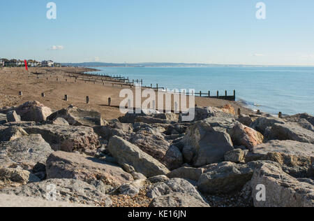 Shingle beach on the seafront at Worthing, West Sussex, England. View east towards Brighton. Stock Photo