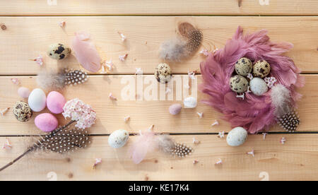 Rustic wooden background for easter with colorful easter eggs Stock Photo