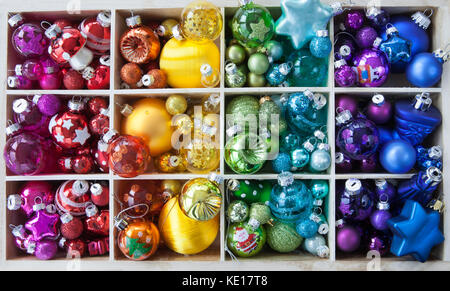 Christmas baubles in various bright colors as a background Stock Photo