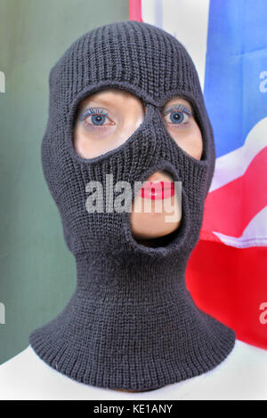 Female terrorist with rib knit three hole balaclava Stock Photo