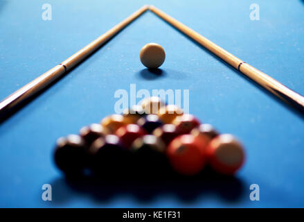 Billiard balls in a blue pool table Stock Photo