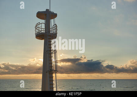 Beautiful sunrise above the Mediterranean Sea and lifeguard tower on the beach. Torrevieja. Costa Blanca. Spain Stock Photo