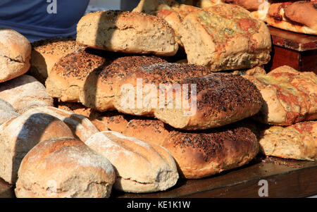 Loaves of bread at a market stall during a food festival in Salisbury, Wiltshire. Stock Photo