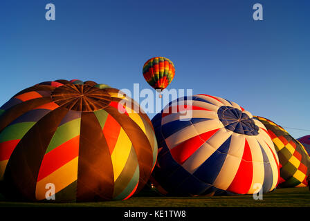 Hot Air Balloon Lifting Off Stock Photo