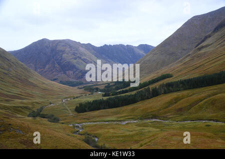 Gleann-leac-na-muidhe and the Clachaig Gully in Glencoe with the Munros Sgorr nam Fiannaidh and Meall Dearg from the Corbett Meall Lighiche, Scotland. Stock Photo