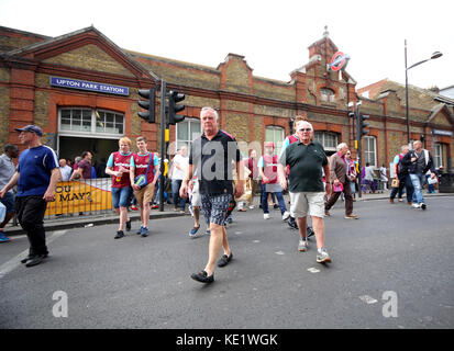 7 May 2016.  West Ham United supporters outside Upton Park tube station before  the final Saturday home game v Swansea City. Stock Photo