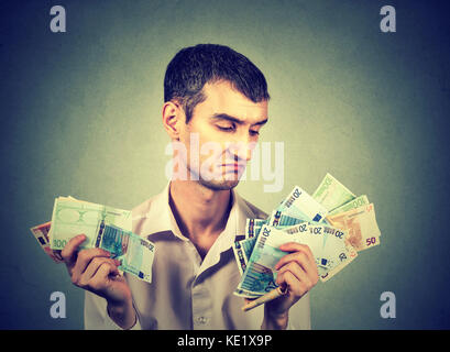 Man with money Stock Photo