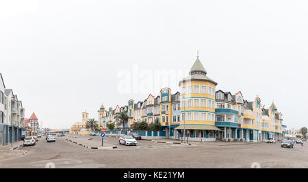 SWAKOPMUND, NAMIBIA - JUNE 30, 2017: A street scene with apartments and businesses in Swakopmund on the Atlantic Coast of Namibia Stock Photo
