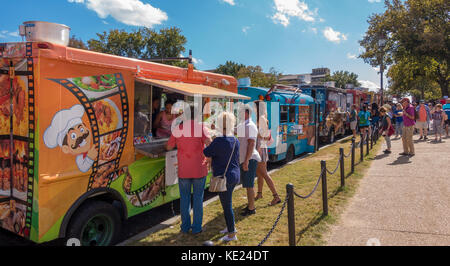 WASHINGTON, DC, USA - Food trucks and people on the National Mall. Stock Photo