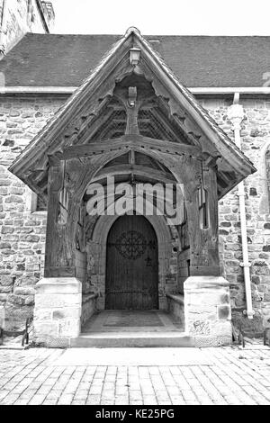 Entrance to the medieval church of england church in Newick, Sussex in black and white Stock Photo