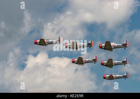 NEW WINDSOR, NY - JULY 2, 2017: The GEICO Skytypers Air Show Team perform at the New York Airshow at Stewart Int Airport. SNJ-2 World War II era plane Stock Photo