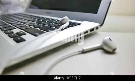 laptop and headsets Stock Photo