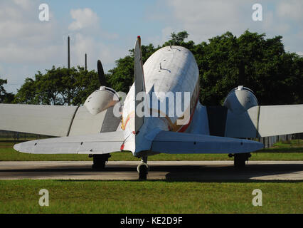 Old turboprop airplane seen from below Stock Photo - Alamy