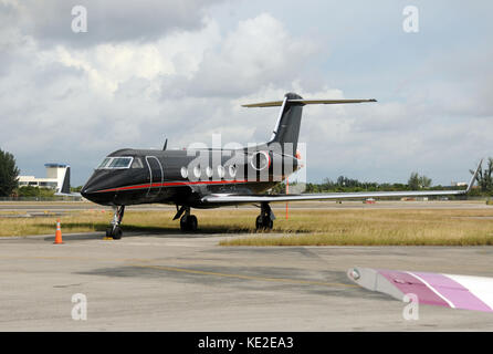 Luxury private jet painted black color Stock Photo